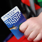 Compass Card in child's hand