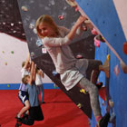 Girl on indoor climbing wall.